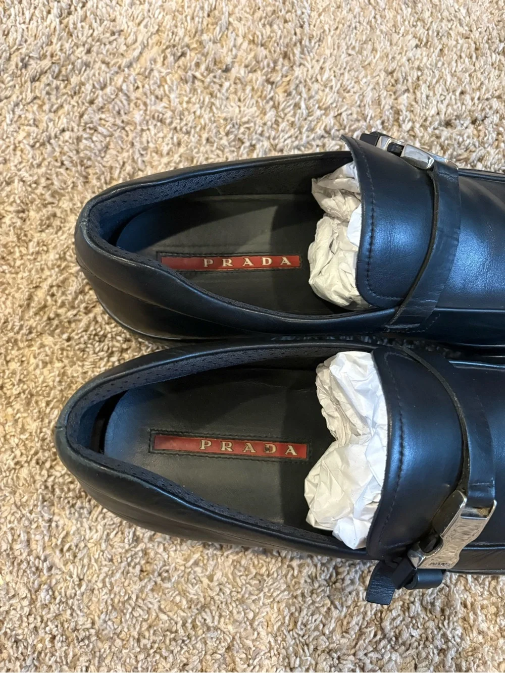 Prada Linea Rossa Black Leather Slip-On Loafers with Metal Buckle